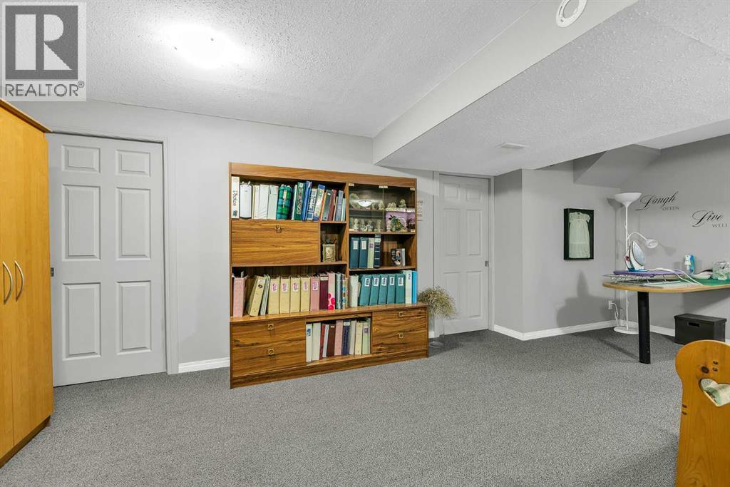 128 Reunion Mews Nw, Airdrie, Alberta  T4B 0J5 - Photo 35 - A2324807