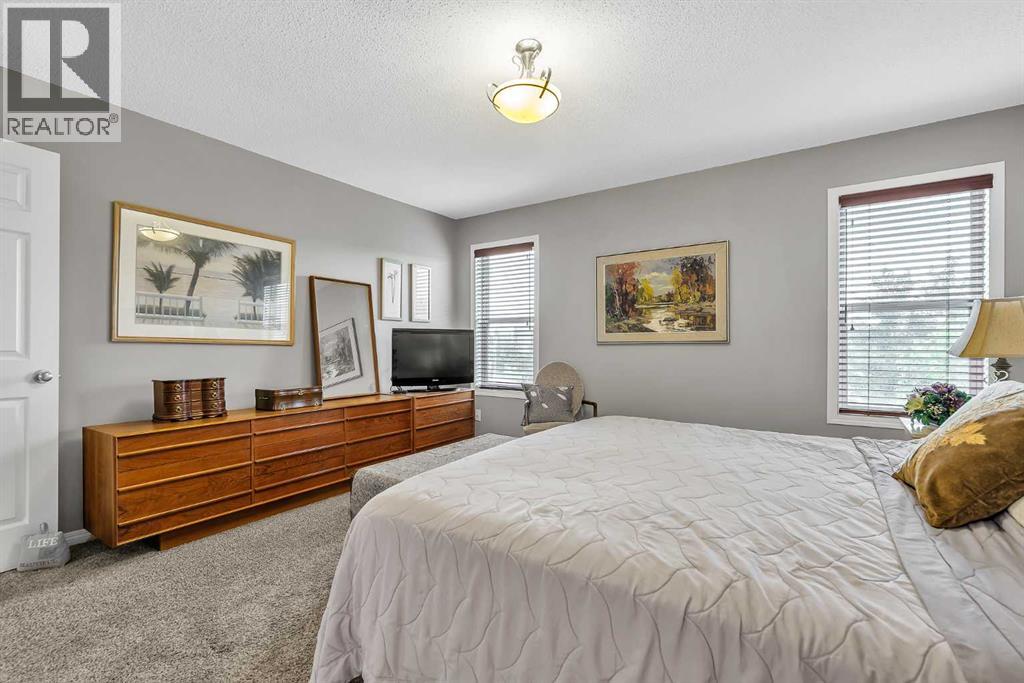 128 Reunion Mews Nw, Airdrie, Alberta  T4B 0J5 - Photo 23 - A2324807