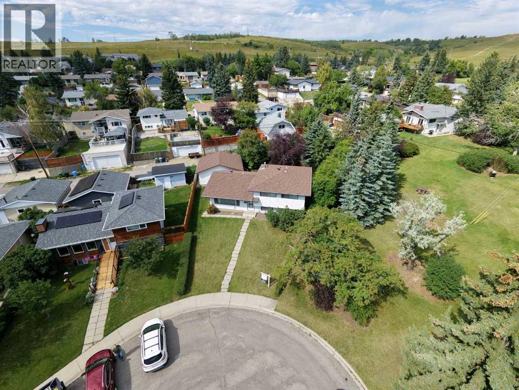 5031 Newcombe Place Nw, Calgary, Alberta  T2K 2P6 - Photo 1 - A2339693