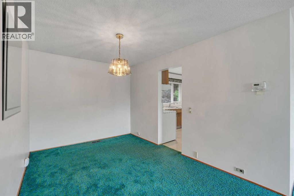 5031 Newcombe Place Nw, Calgary, Alberta  T2K 2P6 - Photo 6 - A2339693