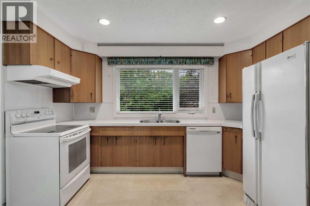 5031 Newcombe Place Nw, Calgary, Alberta  T2K 2P6 - Photo 7 - A2339693