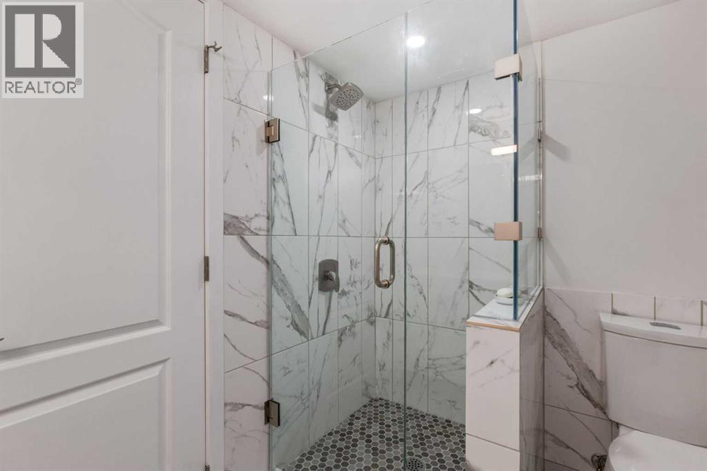 1527 Evergreen Drive SW, Calgary, Alberta  T2Y 2X7 - Photo 38 - A2337001