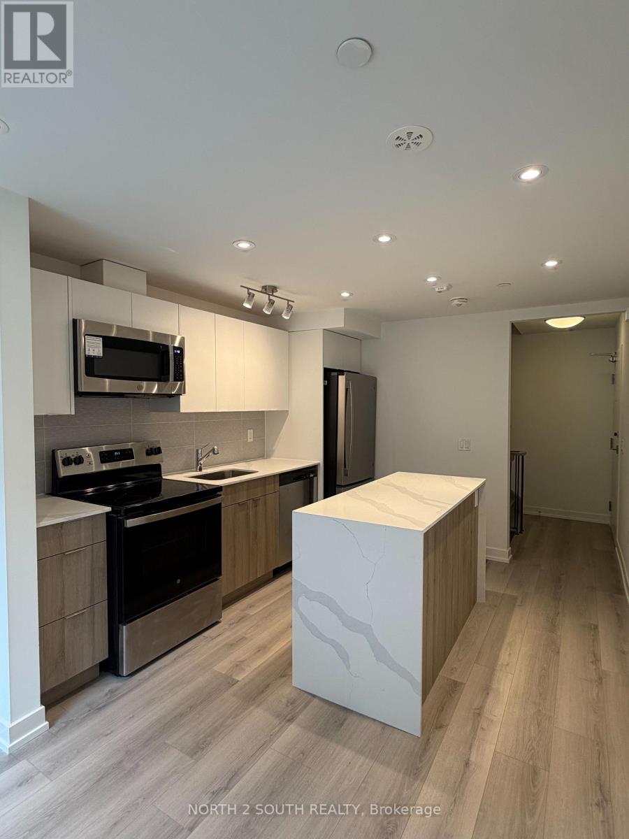 63 - 10 Calamint Lane, Toronto, Ontario  M1W 2H1 - Photo 4 - E13708696