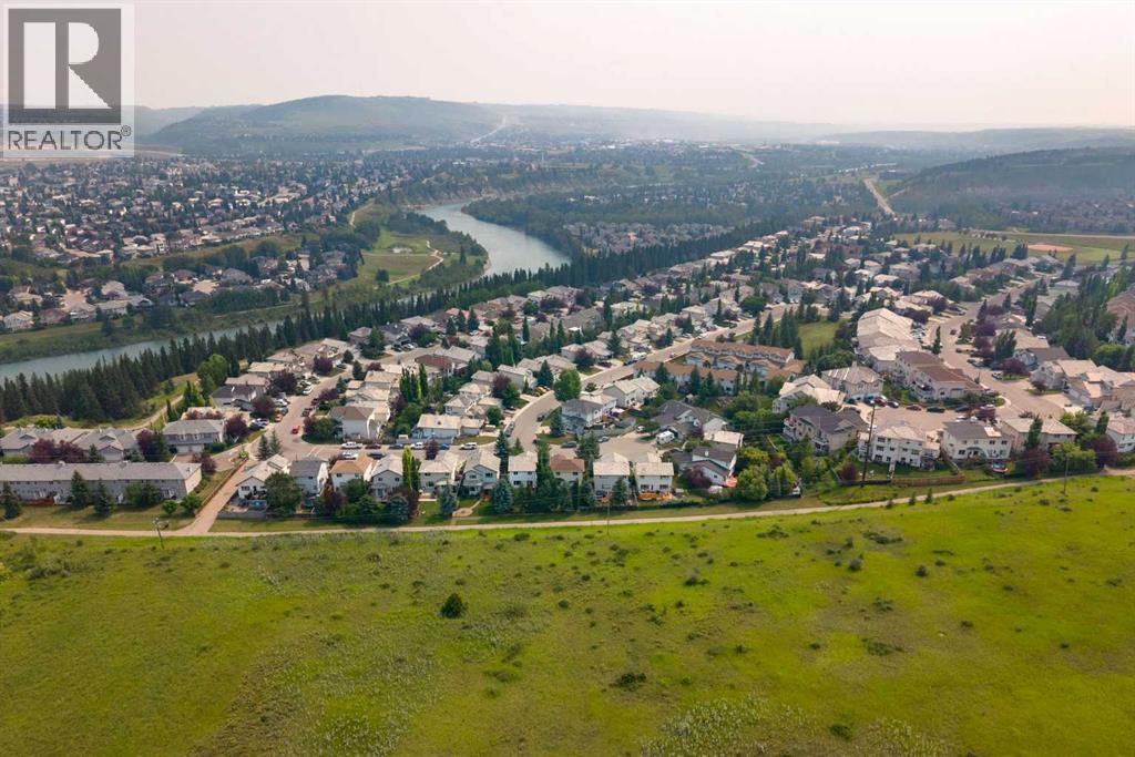 100 Bow Ridge Crescent, Cochrane, Alberta  T4C 1V2 - Photo 39 - A2332337