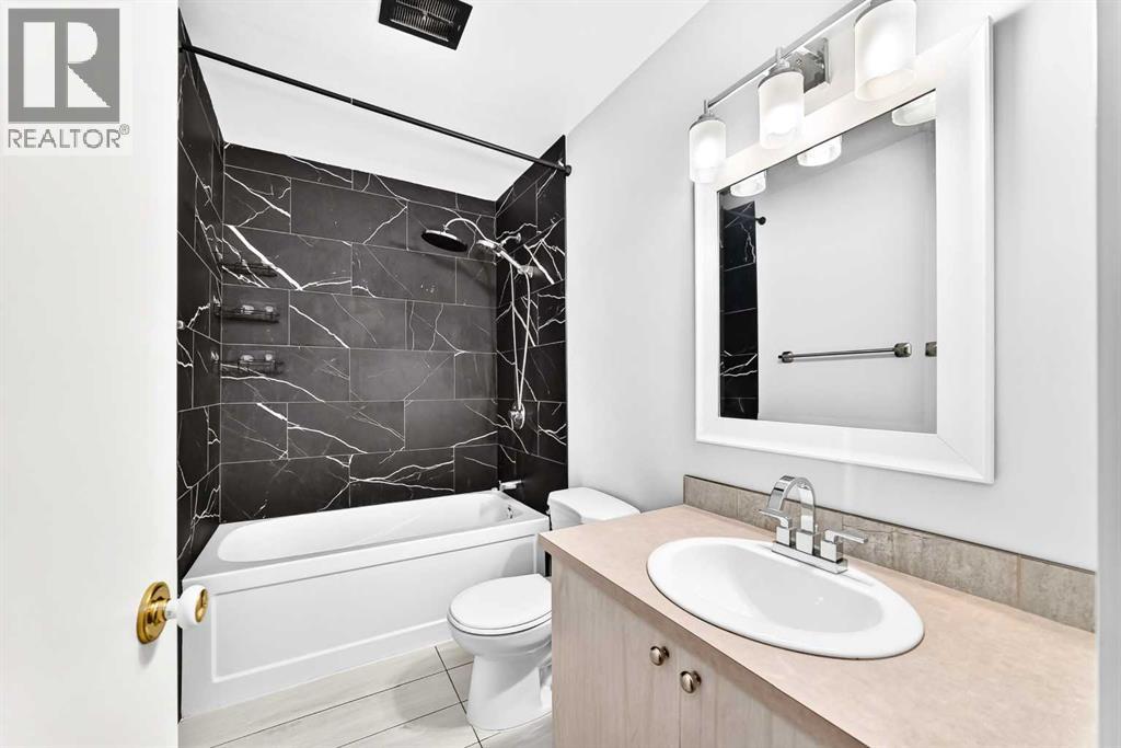 84 Brae Glen Lane SW, Calgary, Alberta  T2W 1B6 - Photo 26 - A2339552
