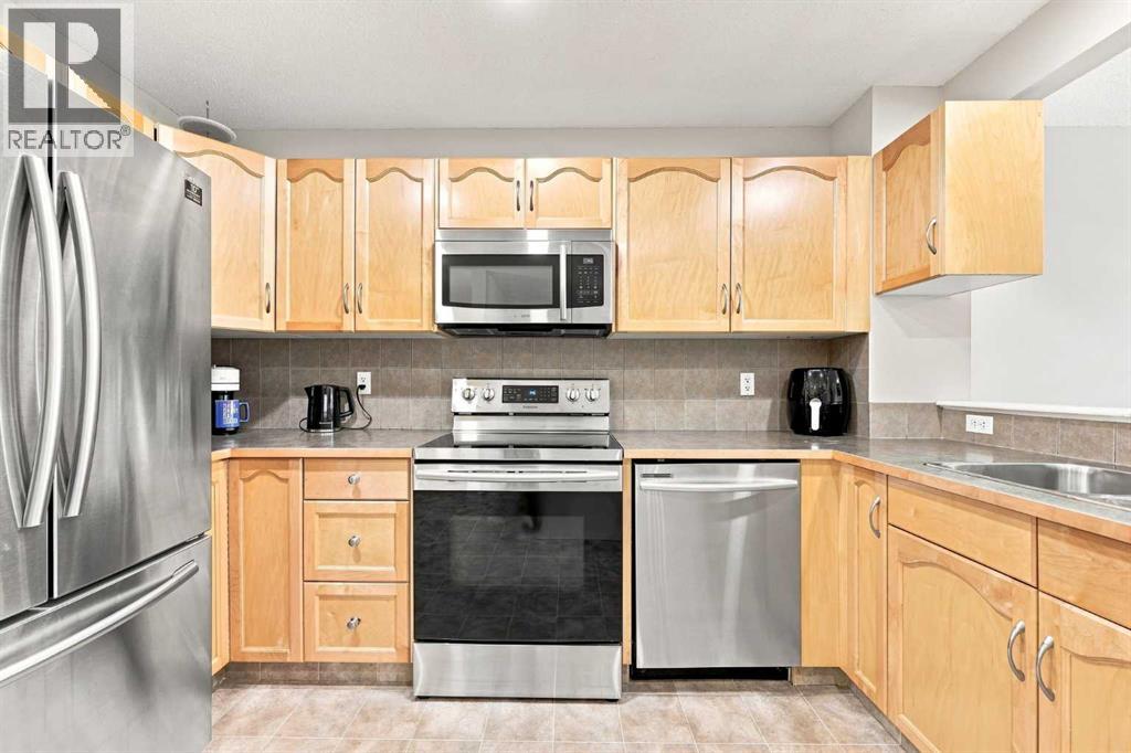 754 Luxstone Gate Sw, Airdrie, Alberta  T4B 0H3 - Photo 8 - A2337244