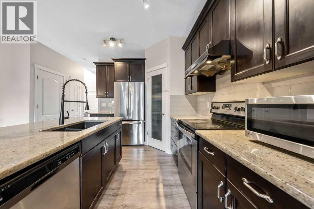 132 Evansborough Way NW, Calgary, Alberta T3P 1B1 - Photo 9 - A2335940