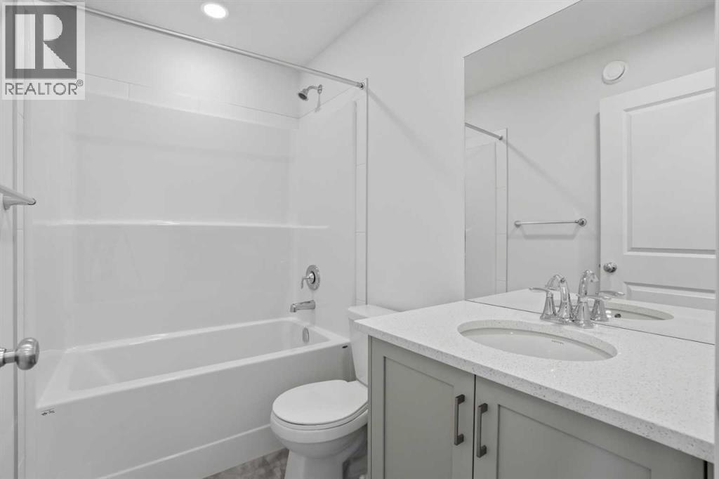 49 Belmont Drive Sw, Calgary, Alberta  T2X 4Z6 - Photo 25 - A2292315