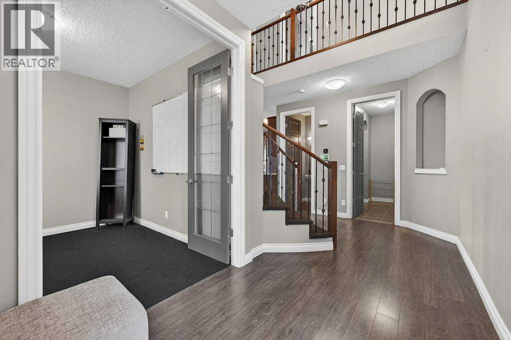 76 Rainbow Falls Boulevard, Chestermere, Alberta  T1X 0S6 - Photo 4 - A2316289