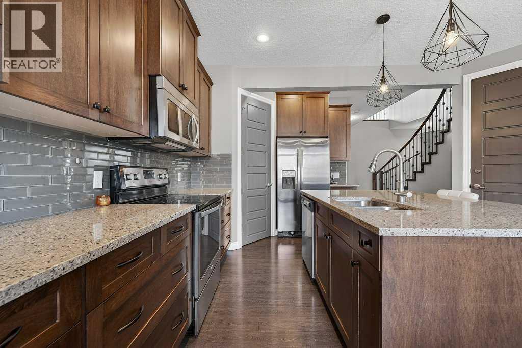 76 Rainbow Falls Boulevard, Chestermere, Alberta  T1X 0S6 - Photo 14 - A2316289