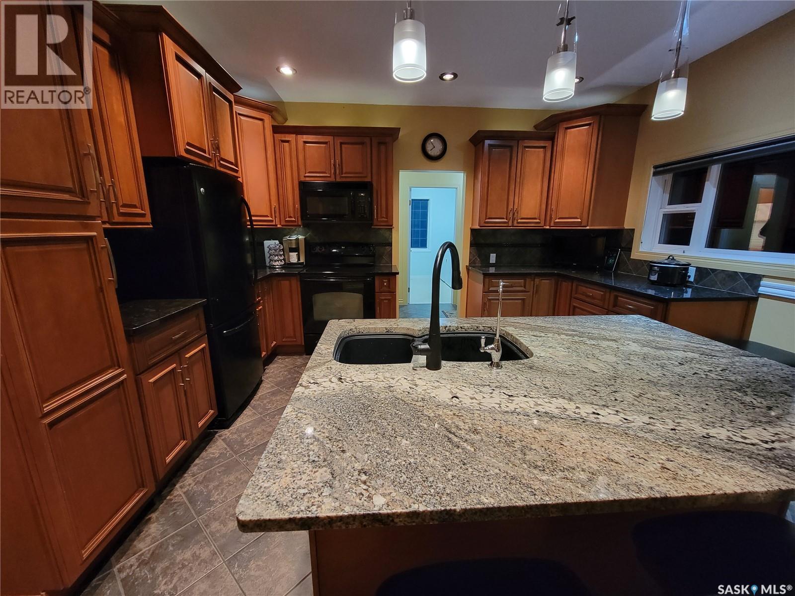 560 4th Avenue E, Unity, Saskatchewan  S0K 4L0 - Photo 8 - SK046565