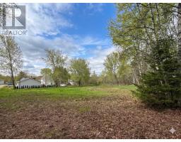 <div class="price">$23,500</div> 31 Rink Street<br>Maccan, Nova Scotia<br>