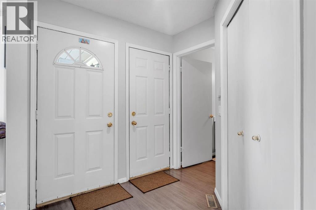 11 Arbour Summit Close Nw, Calgary, Alberta  T3G 3W1 - Photo 4 - A2338844