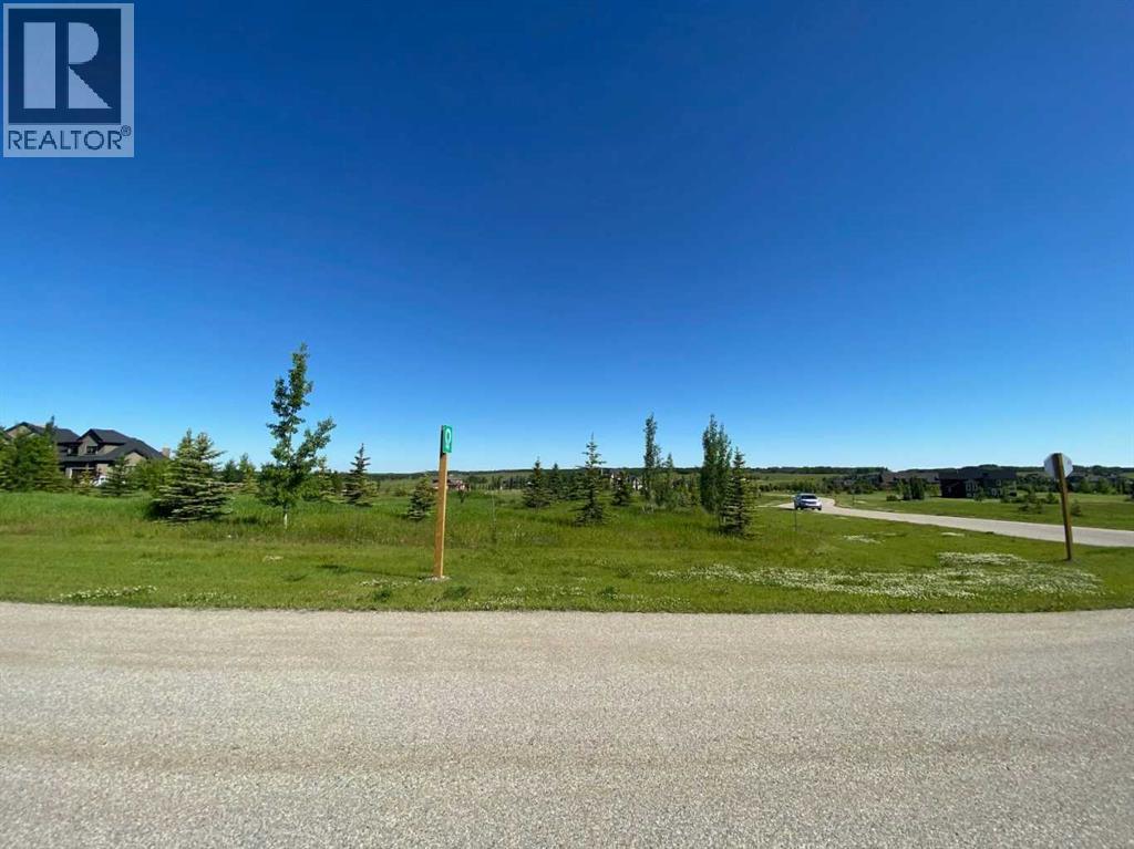 15 Grizzly Way, Rural Rocky View County, Alberta  T4C 0B5 - Photo 6 - A2336293
