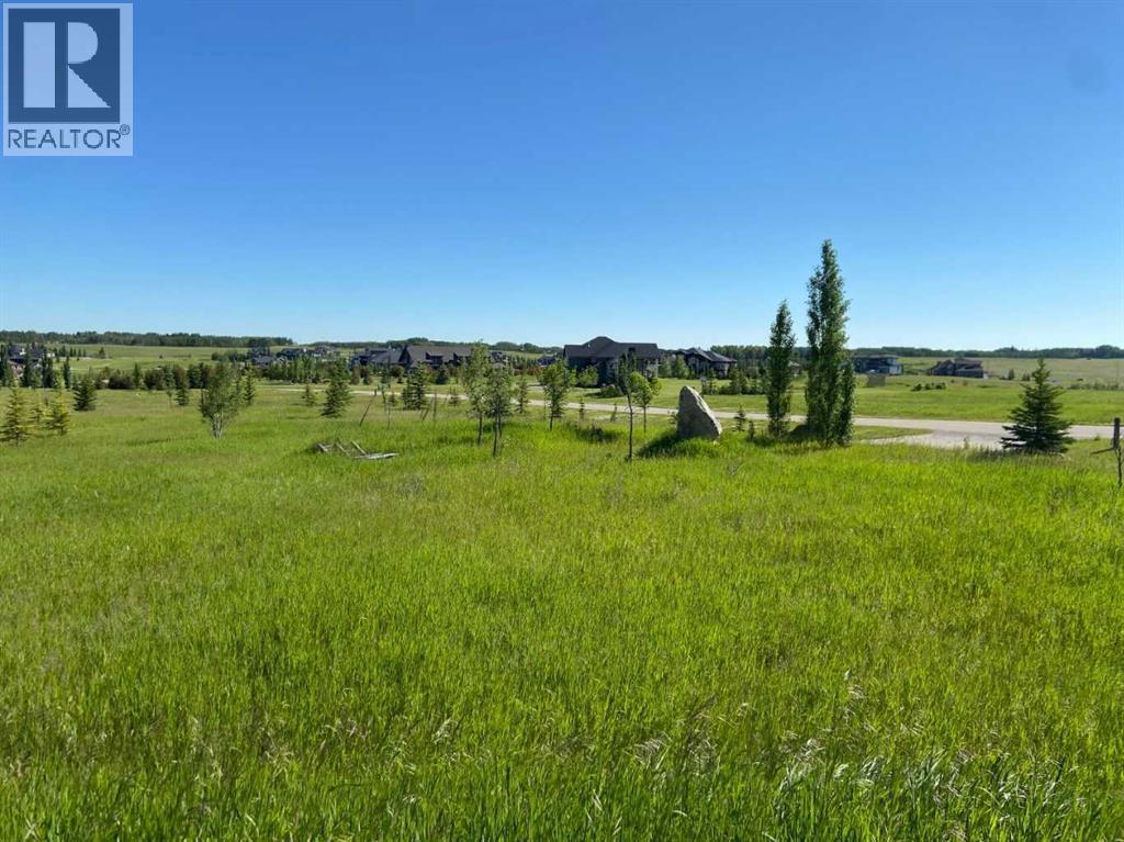 15 Grizzly Way, Rural Rocky View County, Alberta  T4C 0B5 - Photo 5 - A2336293