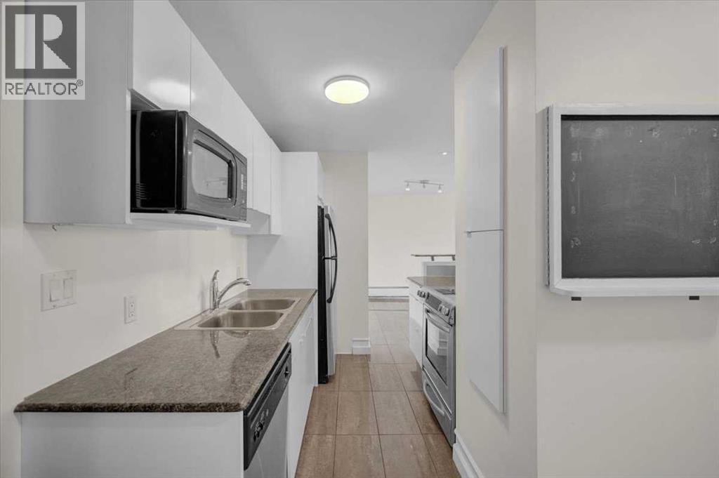 704, 706 15 Avenue Sw, Calgary, Alberta  T2R 0R7 - Photo 5 - A2313426