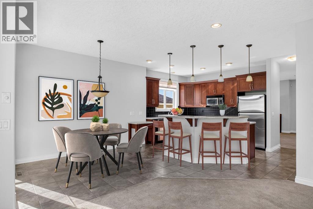 14 Discovery Woods Villas Sw, Calgary, Alberta  T2H 5A6 - Photo 6 - A2313697