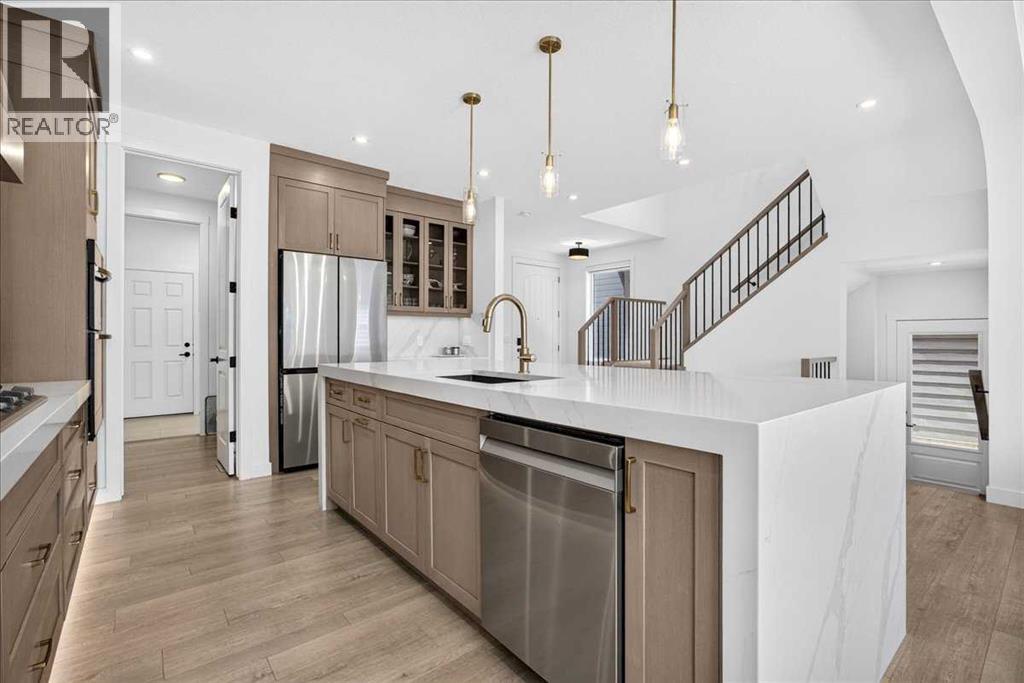 77 Rowmont Common NW, Calgary, Alberta  T3L 0L2 - Photo 12 - A2339729