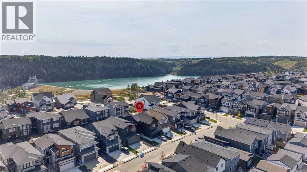 77 Rowmont Common NW, Calgary, Alberta  T3L 0L2 - Photo 3 - A2339729