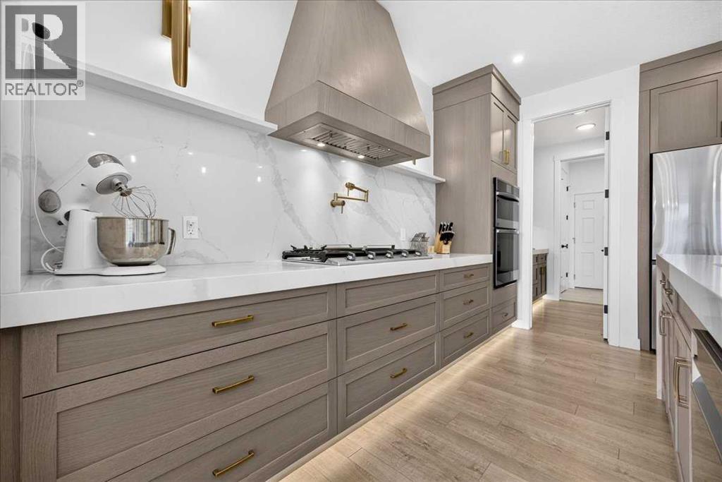 77 Rowmont Common NW, Calgary, Alberta  T3L 0L2 - Photo 13 - A2339729