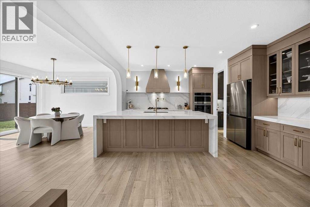 77 Rowmont Common NW, Calgary, Alberta  T3L 0L2 - Photo 11 - A2339729