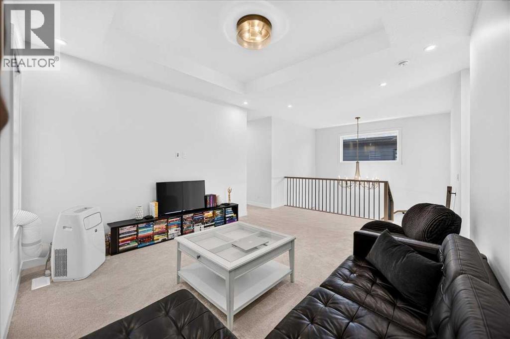 77 Rowmont Common NW, Calgary, Alberta  T3L 0L2 - Photo 22 - A2339729