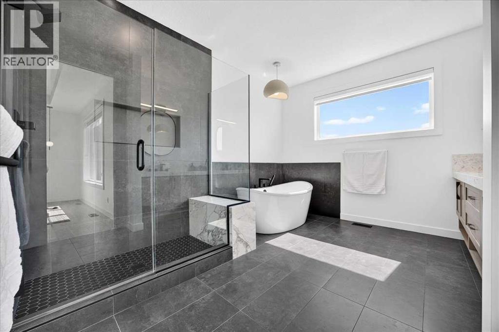 77 Rowmont Common NW, Calgary, Alberta  T3L 0L2 - Photo 25 - A2339729