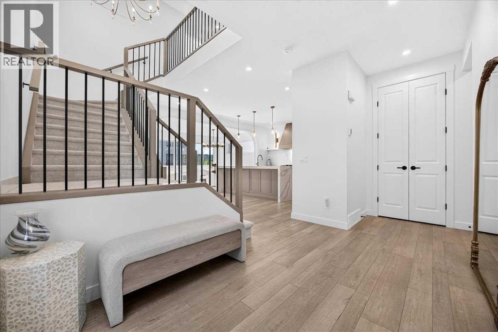 77 Rowmont Common NW, Calgary, Alberta  T3L 0L2 - Photo 4 - A2339729
