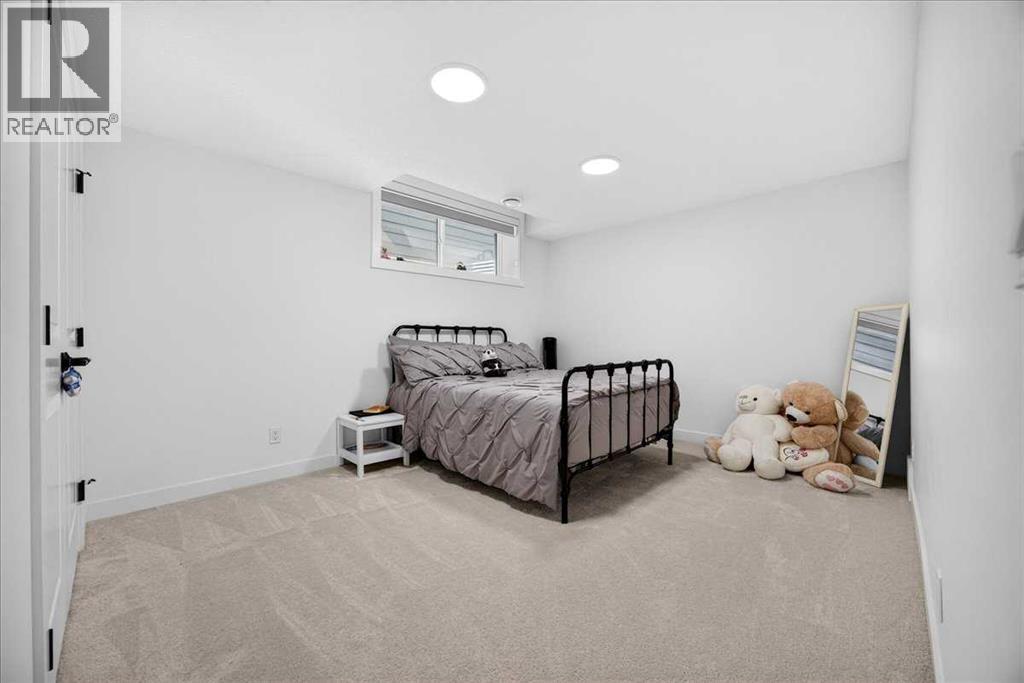 77 Rowmont Common NW, Calgary, Alberta  T3L 0L2 - Photo 39 - A2339729