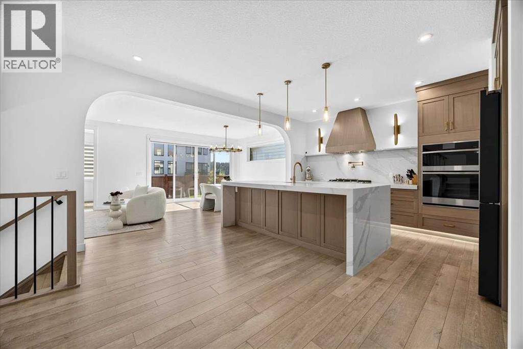77 Rowmont Common NW, Calgary, Alberta  T3L 0L2 - Photo 5 - A2339729