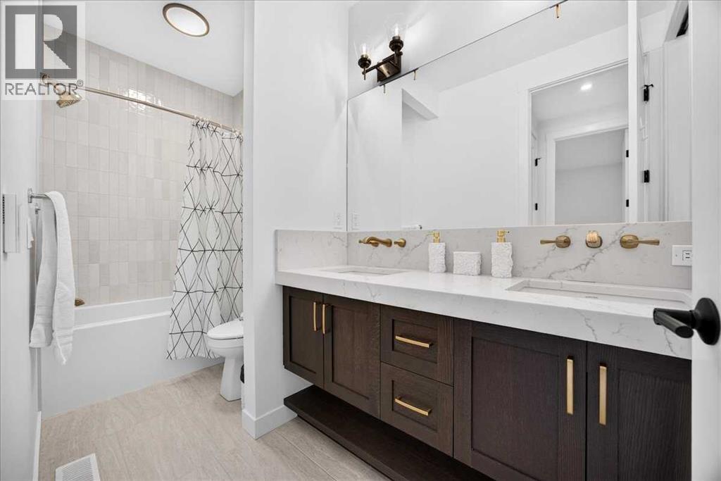 77 Rowmont Common NW, Calgary, Alberta  T3L 0L2 - Photo 32 - A2339729