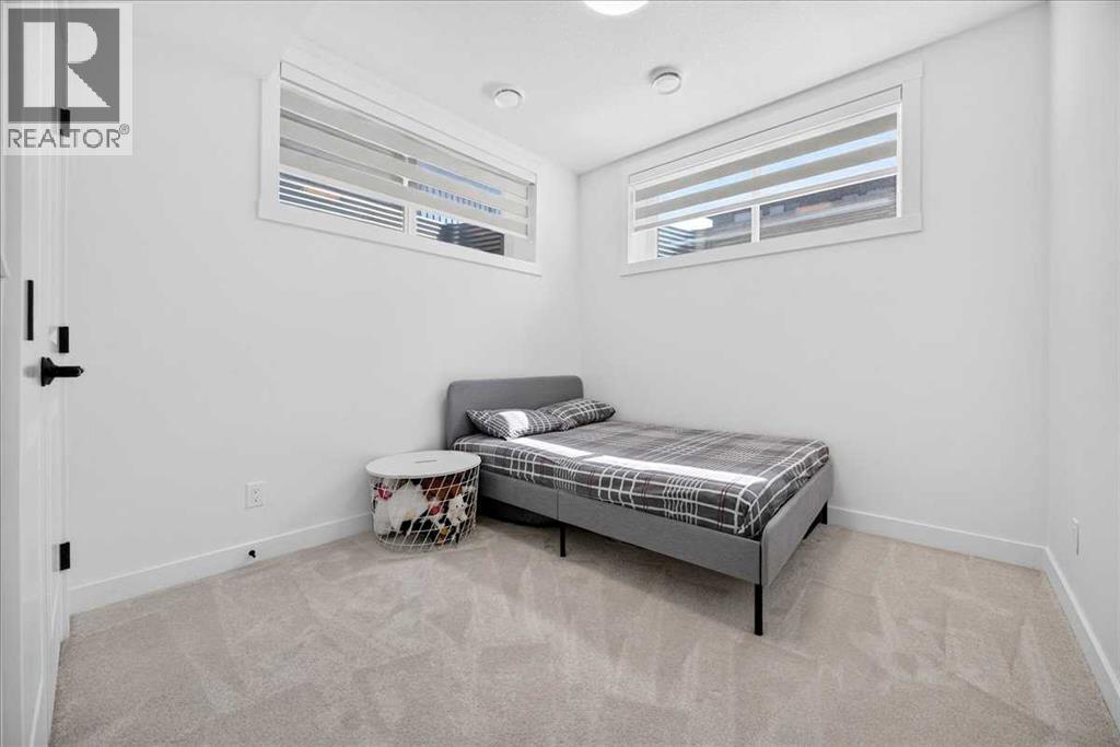 77 Rowmont Common NW, Calgary, Alberta  T3L 0L2 - Photo 42 - A2339729