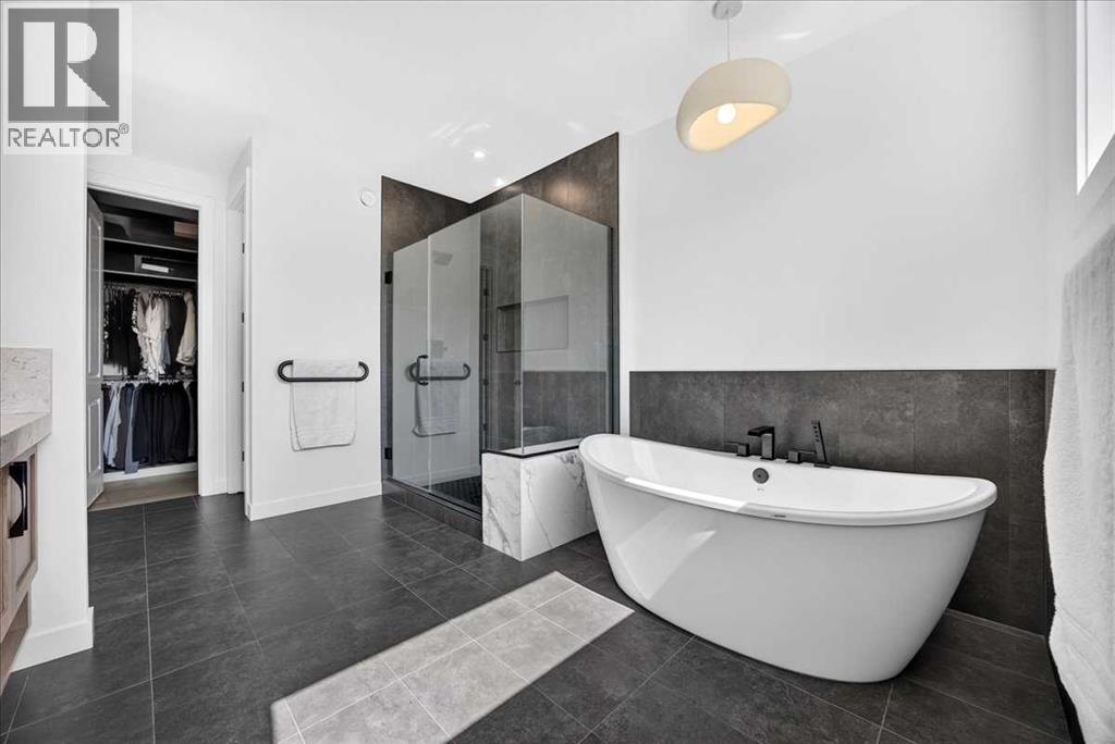 77 Rowmont Common NW, Calgary, Alberta  T3L 0L2 - Photo 27 - A2339729