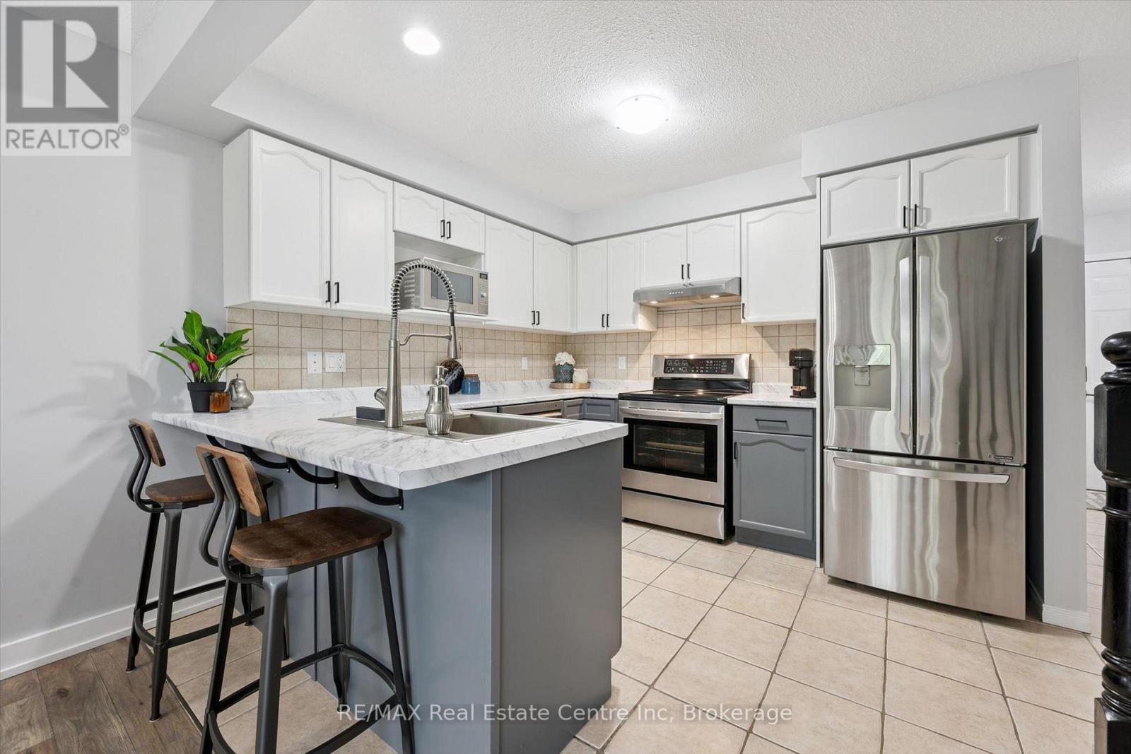 21 - 31 Schroder Crescent, Guelph, Ontario N1E 7M6 - Photo 6 - X13711876