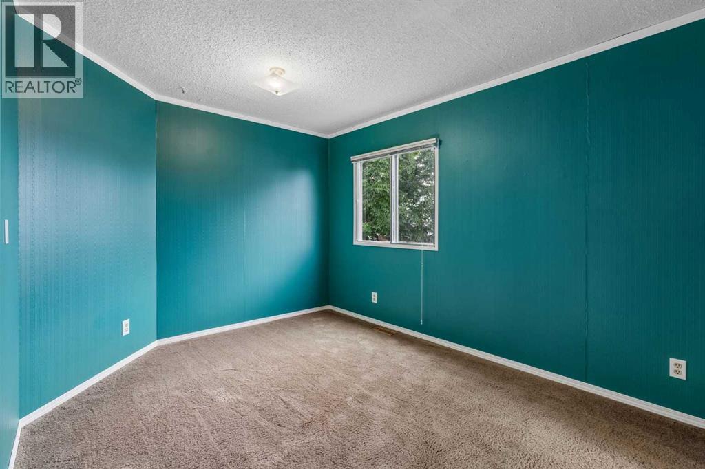 165 Spring Dale Circle Se, Airdrie, Alberta  T4A 1P4 - Photo 20 - A2331139