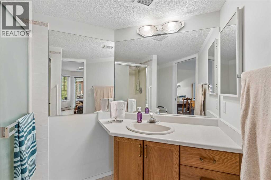 1203, 1203 Sienna Park Green Sw, Calgary, Alberta T3H 3N7 - Photo 22 - A2338703