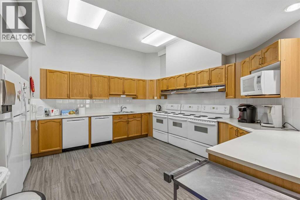 1203, 1203 Sienna Park Green Sw, Calgary, Alberta T3H 3N7 - Photo 37 - A2338703