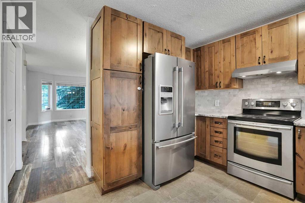 7152 Sierra Morena Boulevard Sw, Calgary, Alberta  T3H 3G8 - Photo 14 - A2330808