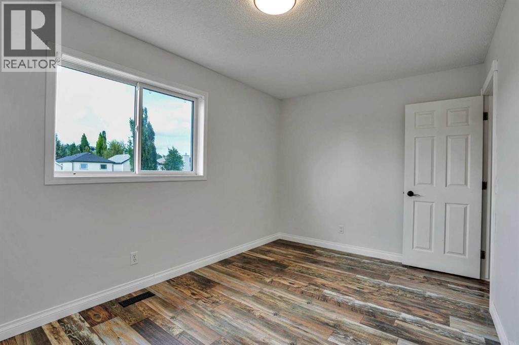 7152 Sierra Morena Boulevard Sw, Calgary, Alberta  T3H 3G8 - Photo 23 - A2330808