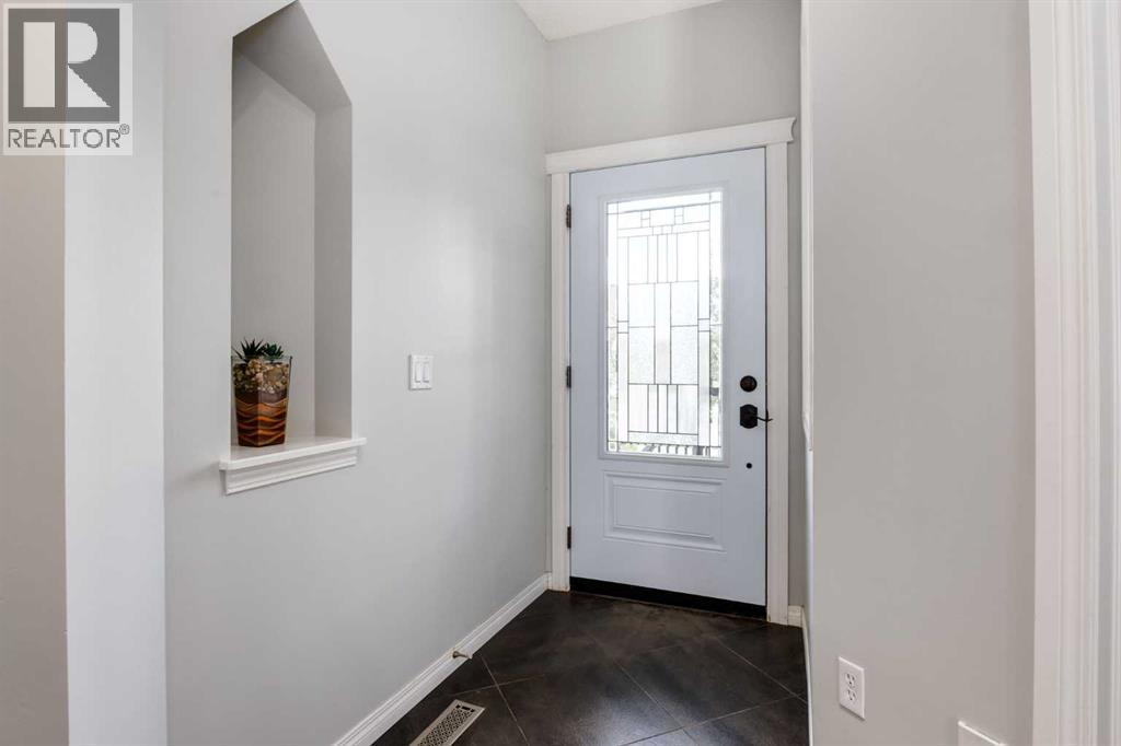 65 Morningside Circle SW, Airdrie, Alberta  T4B 0L7 - Photo 3 - A2324567