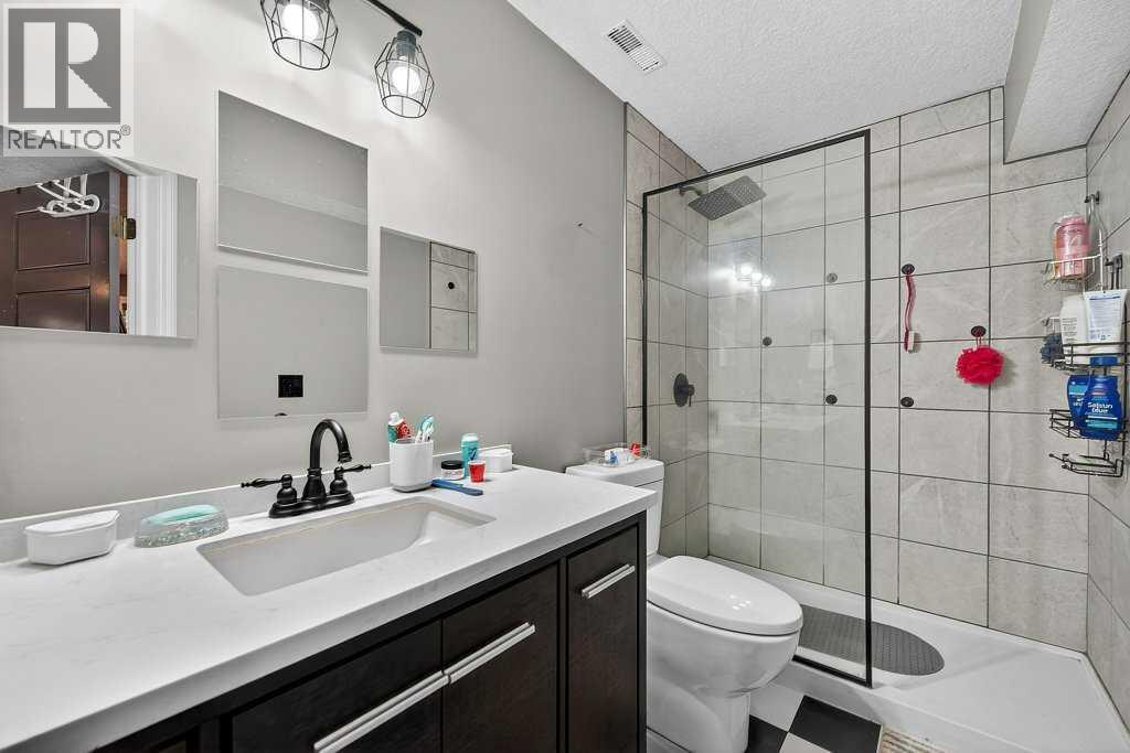 76 Rainbow Falls Boulevard, Chestermere, Alberta  T1X 0S6 - Photo 44 - A2316289