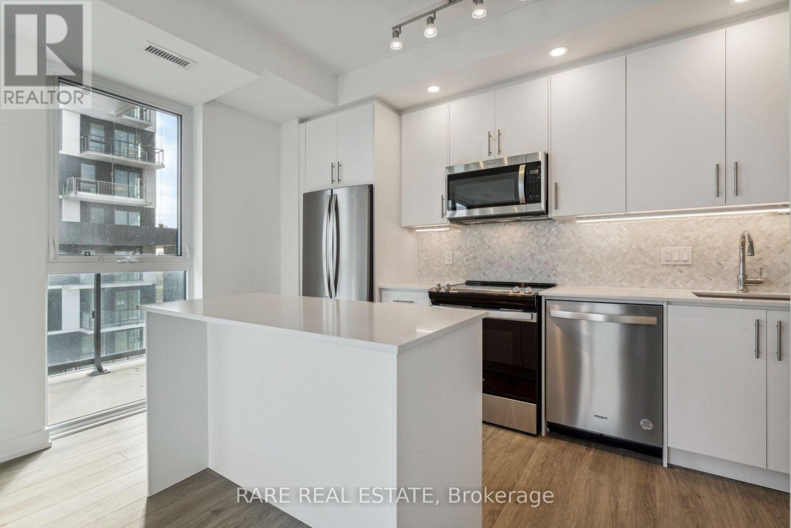 603 - 345 Wheat Boom Drive, Oakville, Ontario  L6H 7X5 - Photo 4 - W13714030