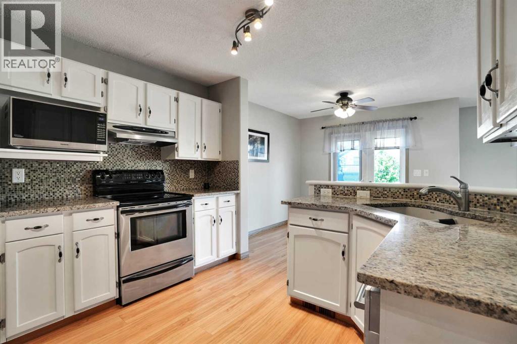 158 Saratoga Close Ne, Calgary, Alberta  T1Y 7A1 - Photo 16 - A2339490