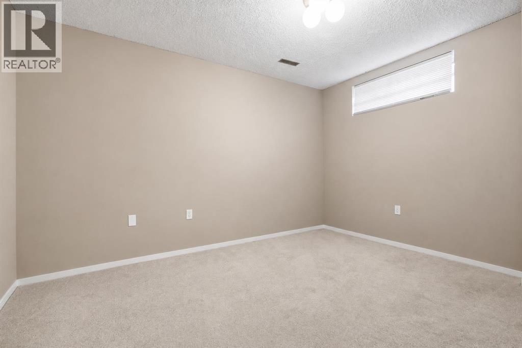 515 Macewan Drive Nw, Calgary, Alberta  T3K 3W5 - Photo 40 - A2329135