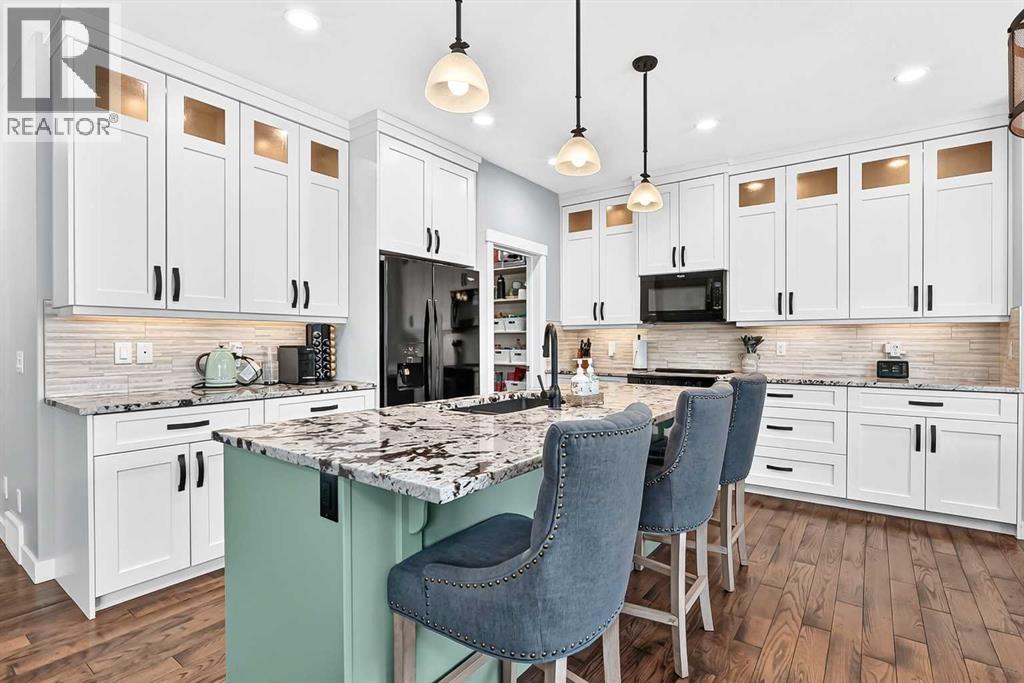 71 Sheep River Cove, Okotoks, Alberta  T1S 0M7 - Photo 6 - A2340215