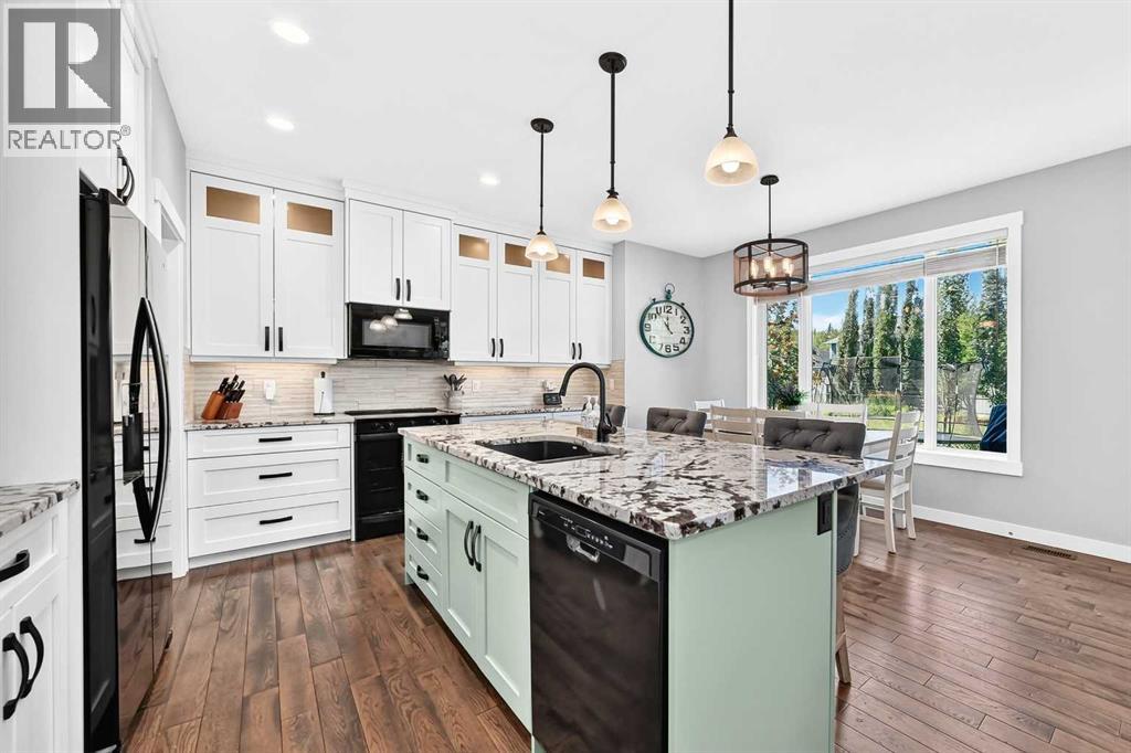 71 Sheep River Cove, Okotoks, Alberta  T1S 0M7 - Photo 11 - A2340215