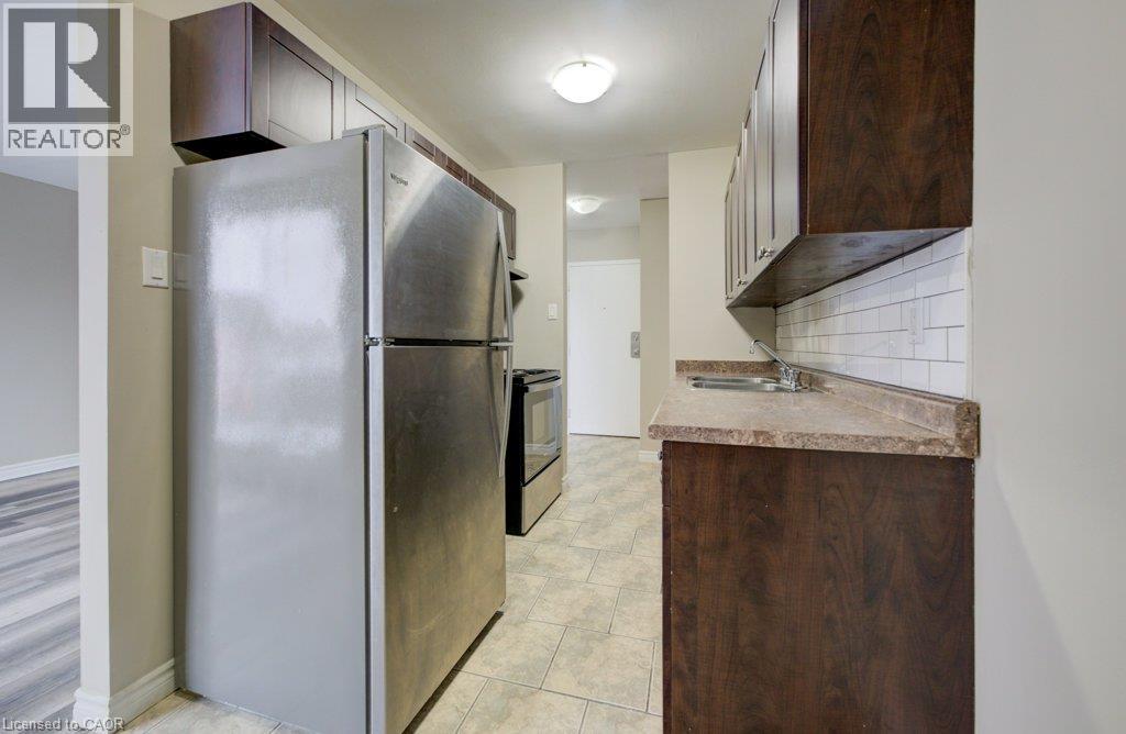 390 Admiral Drive Unit# 307, London, Ontario  N5V 3C2 - Photo 5 - 40847436