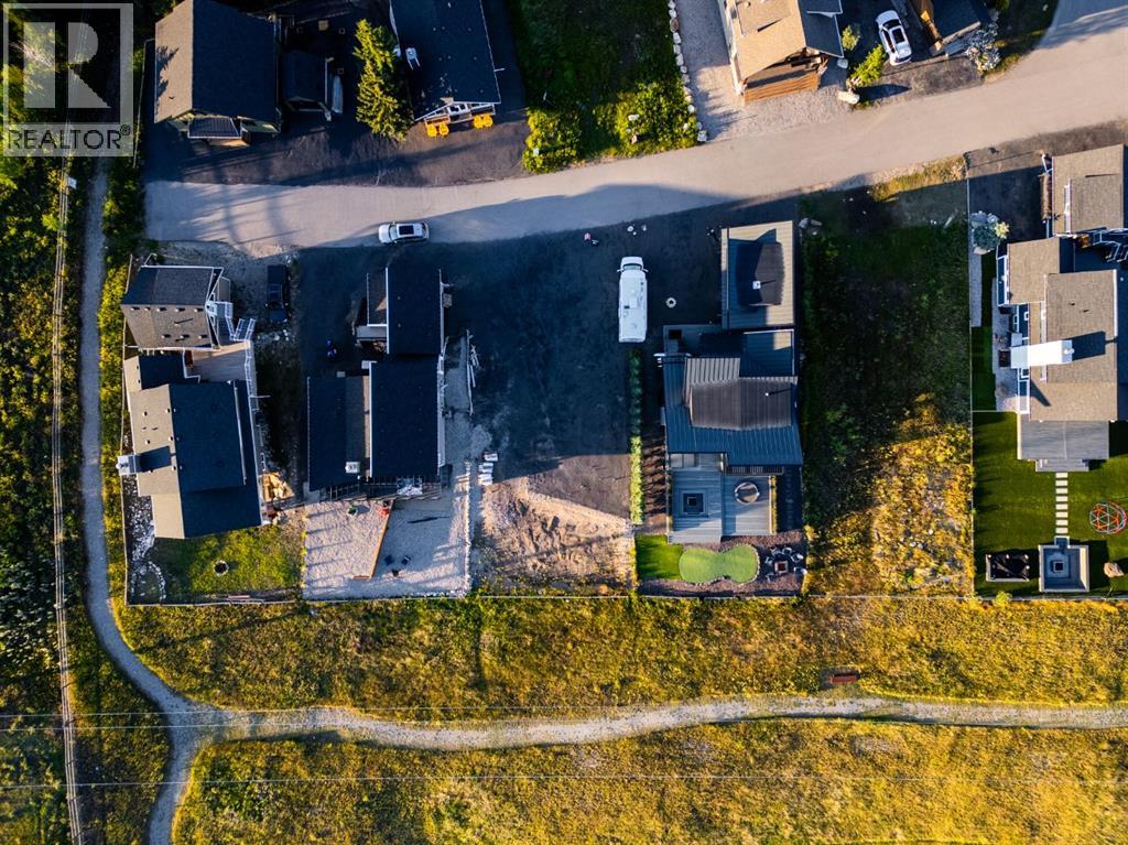 407 Cottageclub Grove, Rural Rocky View County, Alberta T4C 1B1 - Photo 3 - A2289756