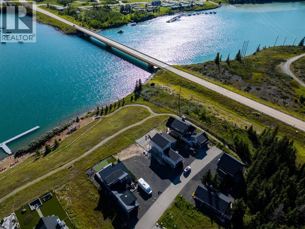 407 Cottageclub Grove, Rural Rocky View County, Alberta T4C 1B1 - Photo 6 - A2289756
