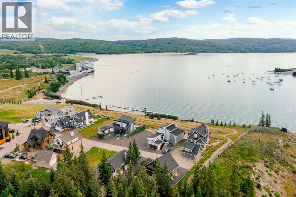 407 Cottageclub Grove, Rural Rocky View County, Alberta T4C 1B1 - Photo 41 - A2289756